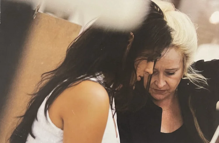 Lisa Hock mentoring a student one-on-one